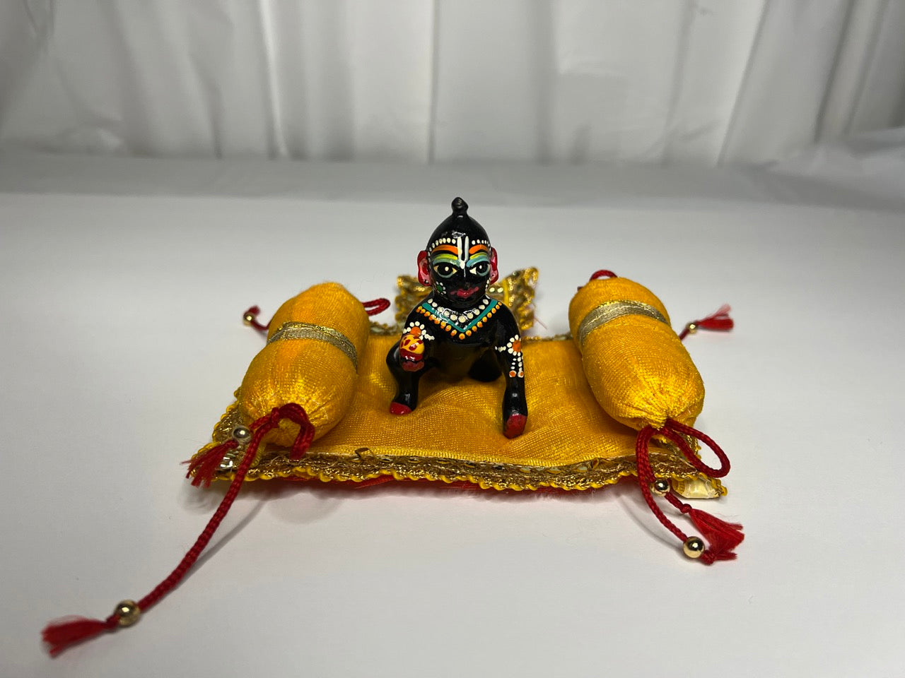 ladoo gopal aasan yellow